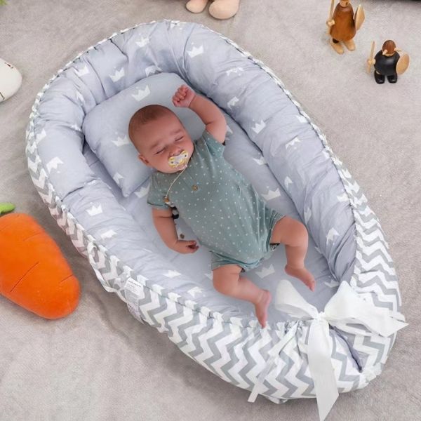 Reducteur-de-lit-bebe-cocooning-1