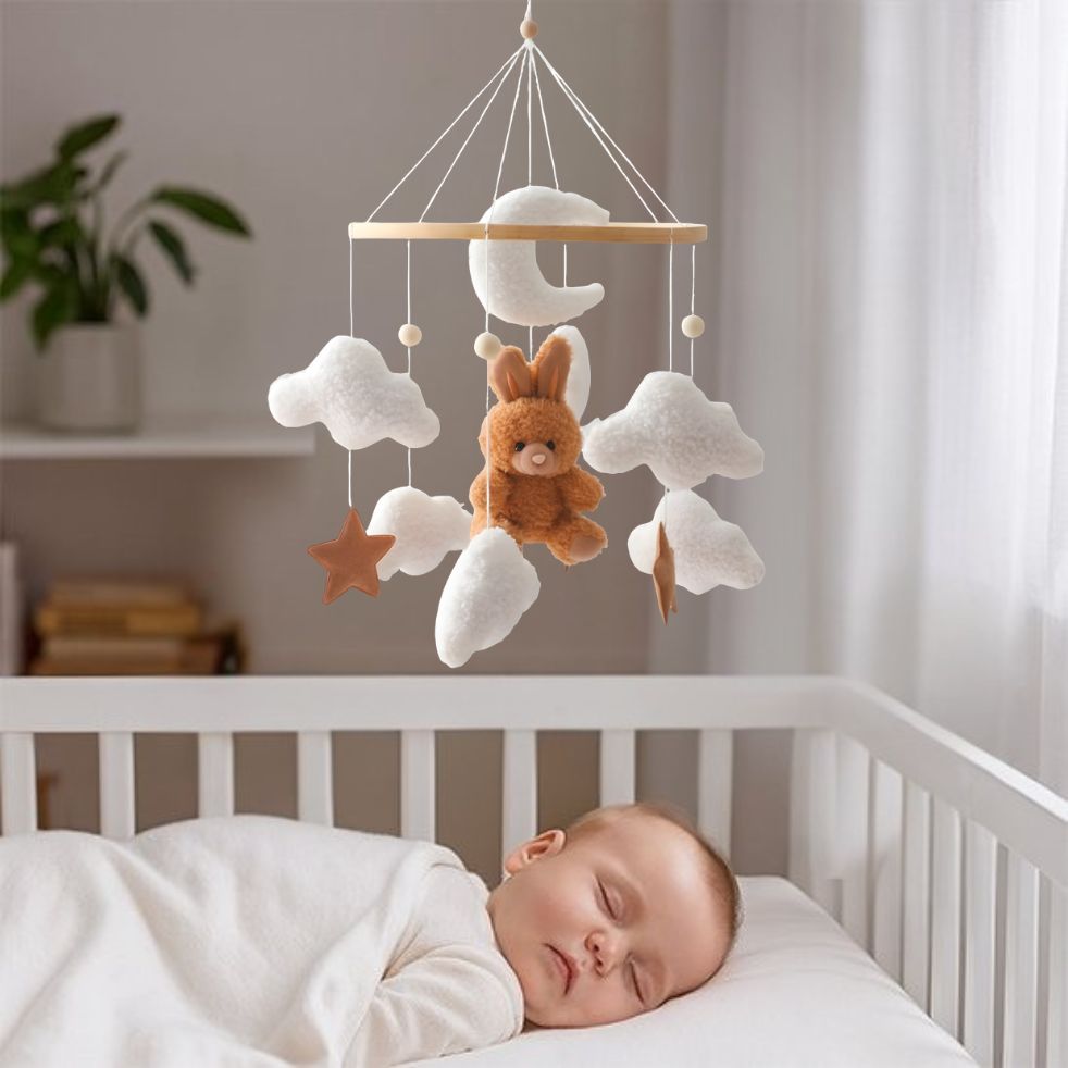 mobile bebe lapin brun bebe endormi dans berceau