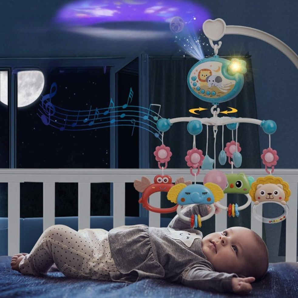 mobile musical bebe joue dans berceau avec hochets