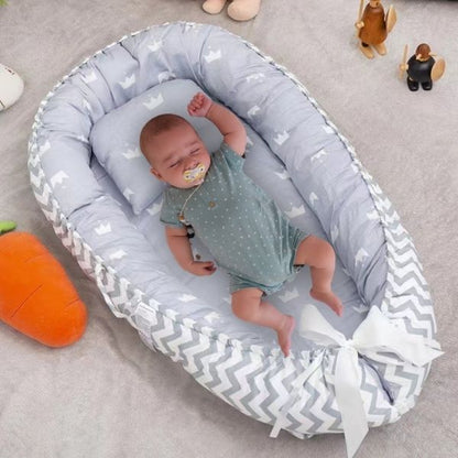 Reducteur-de-lit-bebe-cocooning-1