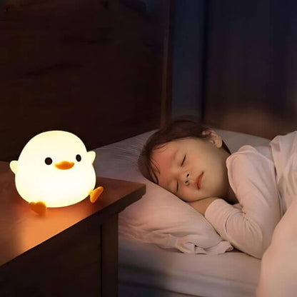Veilleuse-bebe-canard-sommeil-paisible-fille