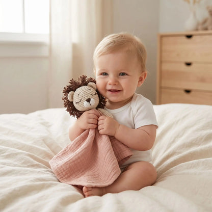 doudou lion rose bébé souriant