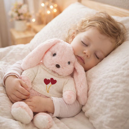 lapin peluche rose coton doux réconfortant fillette endormie paisiblement