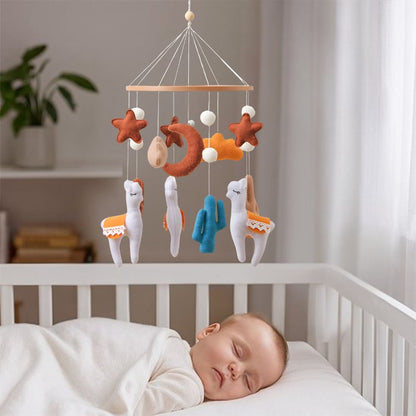 mobile bebe alpaga bebe endormi dans berceau