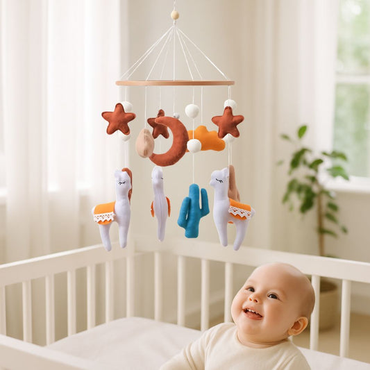 mobile bebe alpaga enfant souriant dans lit