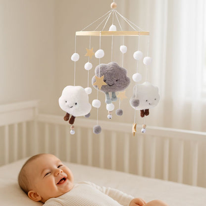 mobile bebe etoile gris blanc garcon souriant
