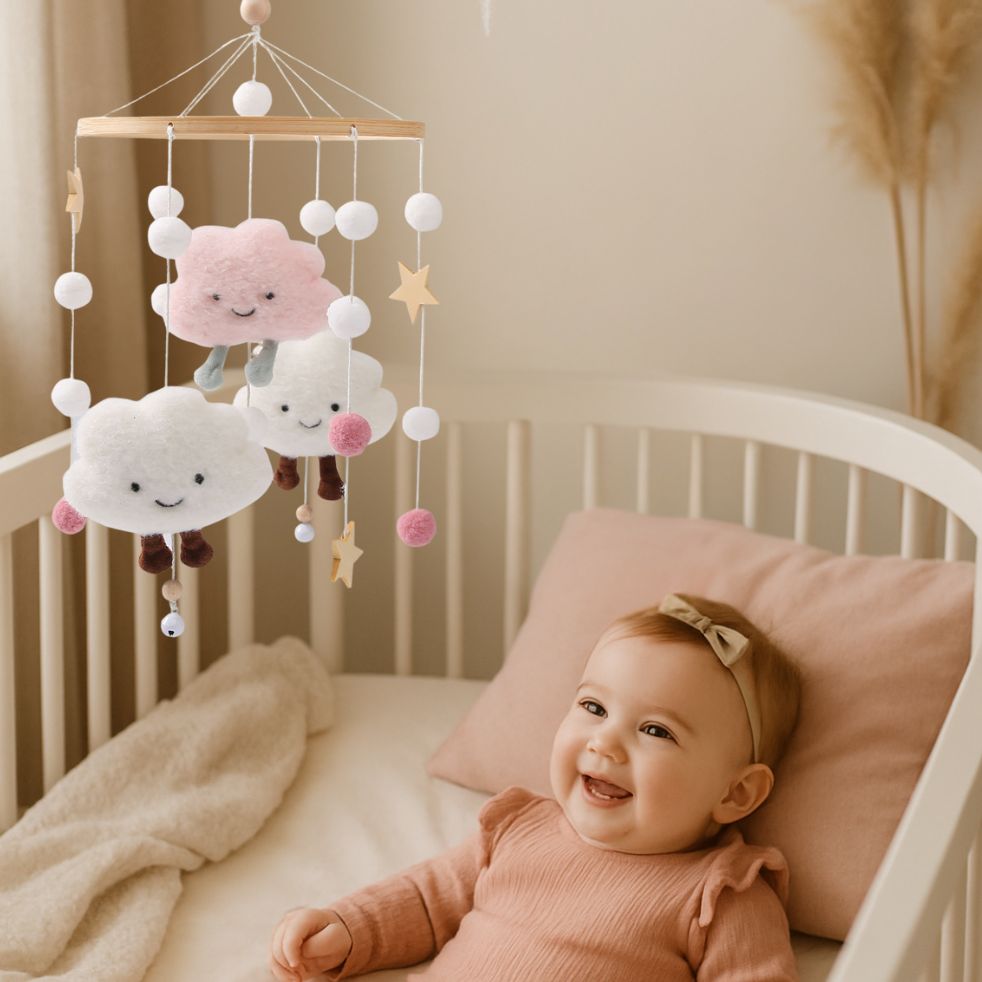 mobile bebe etoile rose blanc eveil enfant dans berceau