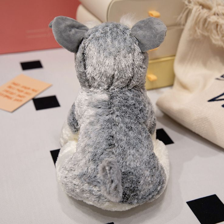 peluche chien schnauzer douce réconfortante aide sommeil enfant dos