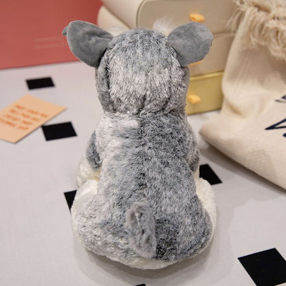 peluche chien schnauzer douce réconfortante aide sommeil enfant dos