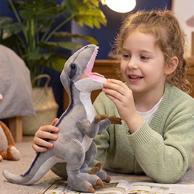 Peluche dinosaure gris fille sourinte