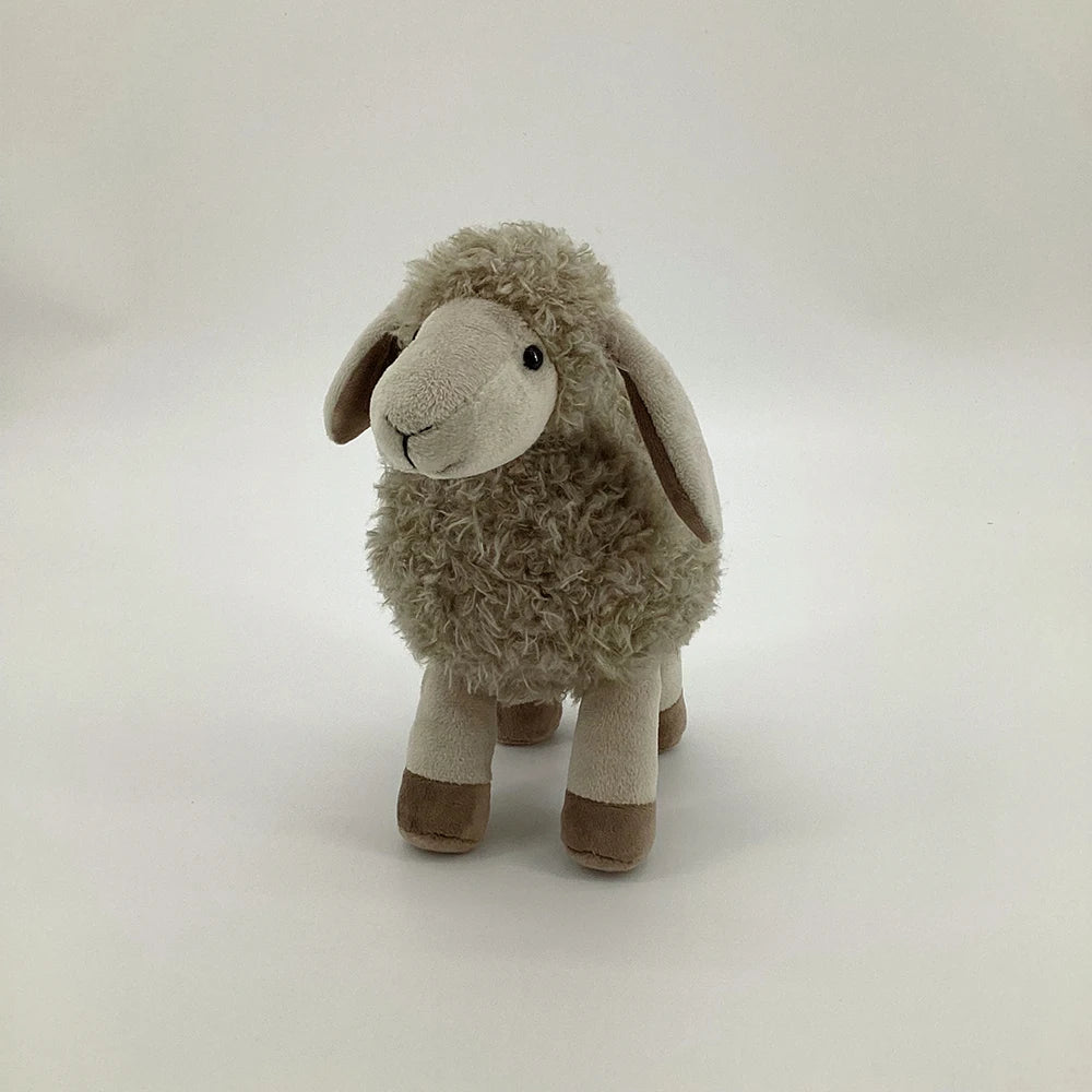 peluche mouton gris douce apaisante mignonne vue du visage