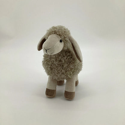 peluche mouton gris douce apaisante mignonne vue du visage
