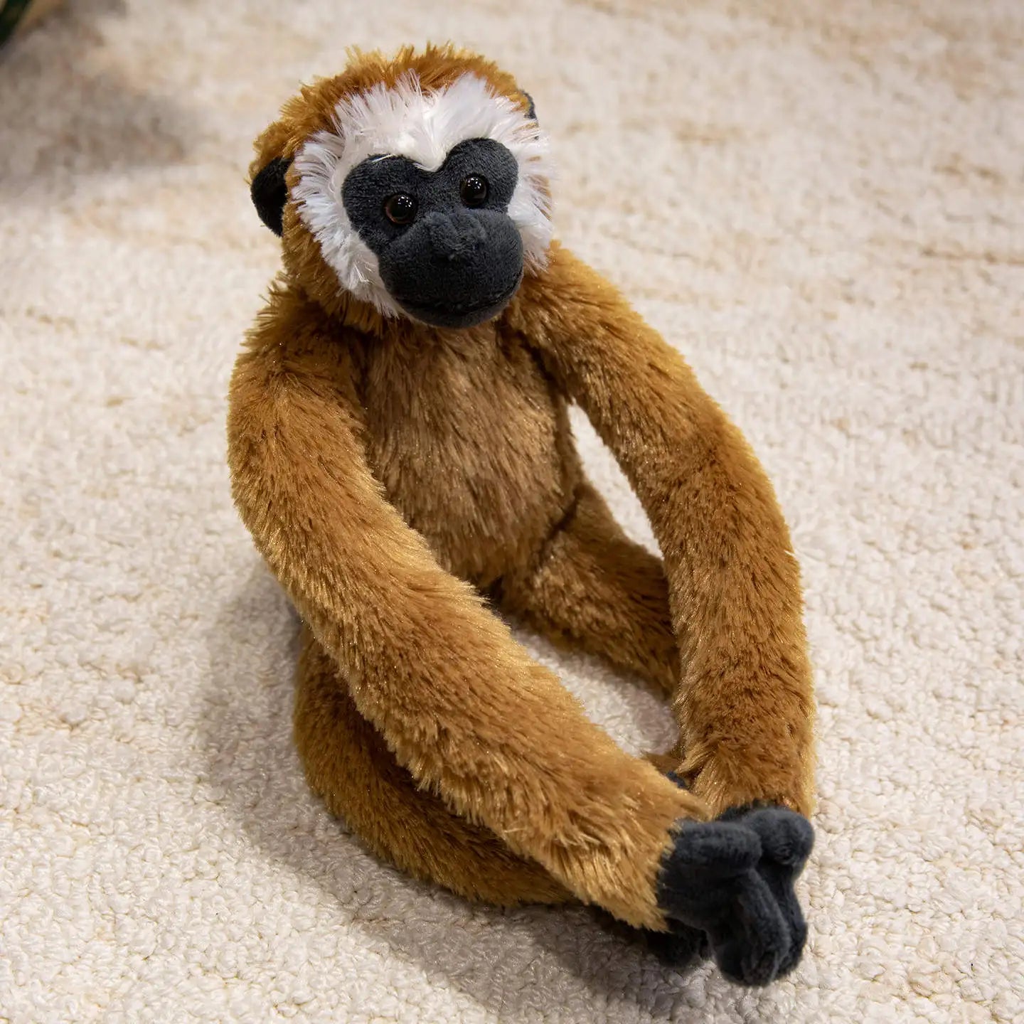 peluche singe brun mignon